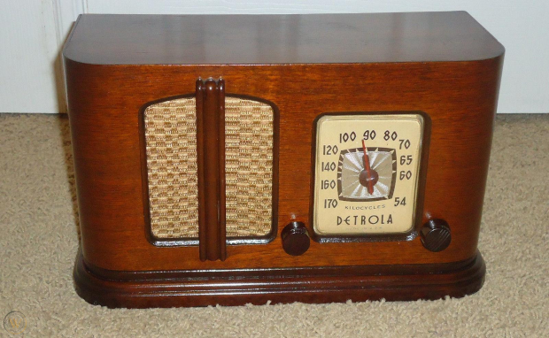 Photo of the broadcast control desk at WJAZ in 1922, consisting of 15 dials, five gauges and other equipment