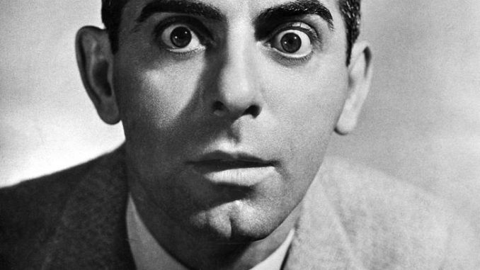 Photo of radio comedian Eddie Cantor that is a close up of his face looking shocked