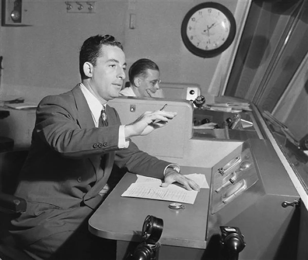Photo of Hiram Brown in a CBS radio studio in New York during a broadcast in 1943