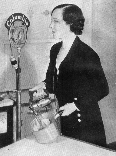 Ida Bailey Allen using a mixer in a bowl at a Columbua radio microphone