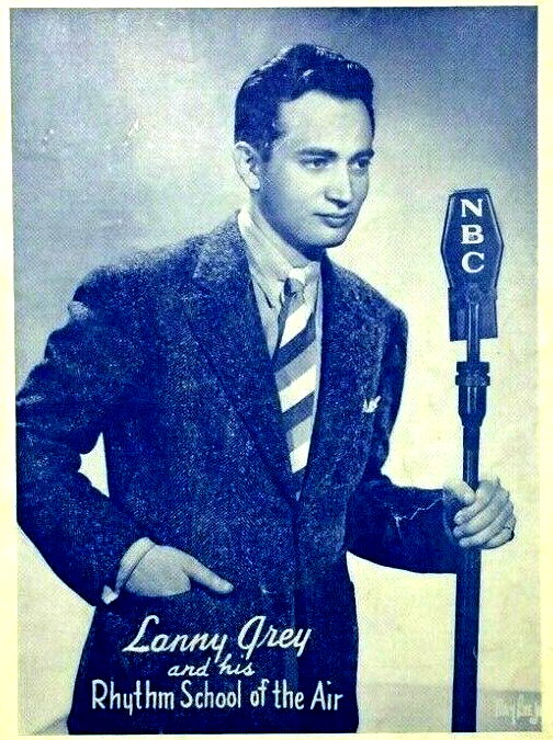 Publicity photo of Lanny Grey holding a microphone on the radio show Rhythm of the Air