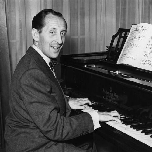 Photo of the legendary pianist Vladimir Horowitz performing at the piano