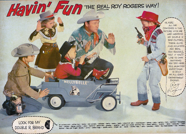 Advertisement from 1958 for Double R brand toys showing Roy Rogers and three children in Western attire being held up by another child with a red bandanna over his face and a toy gun. The heading reads, 'Havin' Fun the Real Roy Rogers Way!' A caption reads, 'Hi, Kids! All the cowpokes in this picture with me are wearing my Double R bar clothes. Their guns and holsters are real Roy Rogers, too! If you'd like to own anything you see here, tell mom that everything is sold at all good department stores -- Roy Rogers.' There's also a caption 'Look for my Double R Brand' followed by the list 'on archery sets, action toys, banks, bed spreads, billfolds, belts, books, boots, chap-vest sets, chuckwagons, gloves, guns, guitars, hats, holsters, horseshoe sets, jackets, jigsaw puzzles, jeans, lanterns, lunch kits, jewelry, pajamas, paint and crayon coloring sets, pencil tablets, records, robes, raincoats, ranch models, Roy and Trigger models, shirts, school bags, saddle seats, slipper sox, slacks, stuffed toys, suits, sweaters, toy stagecoaches, ties, watches