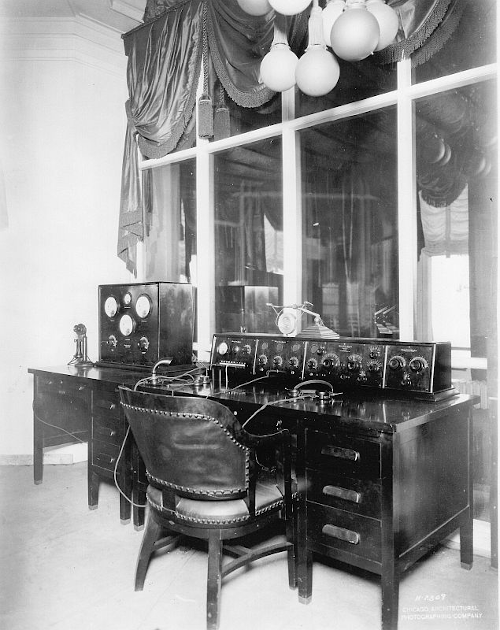 Photo of the broadcast control desk at WJAZ in 1922, consisting of 15 dials, five gauges and other equipment